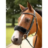 Black leather horse bridle with lemieux simuwool noseband cover in black made of extremely soft faux lambskin
