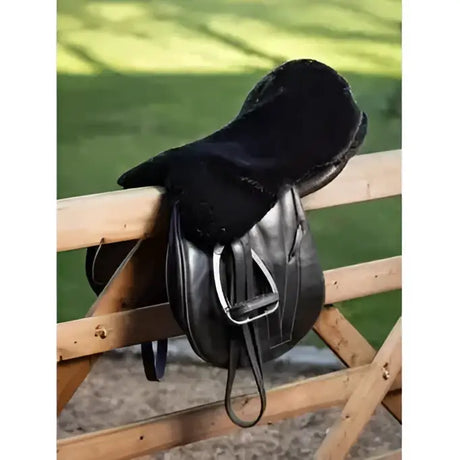 Black leather english saddle with lemieux simuwool seat saver featuring plush black fleece padding for comfort