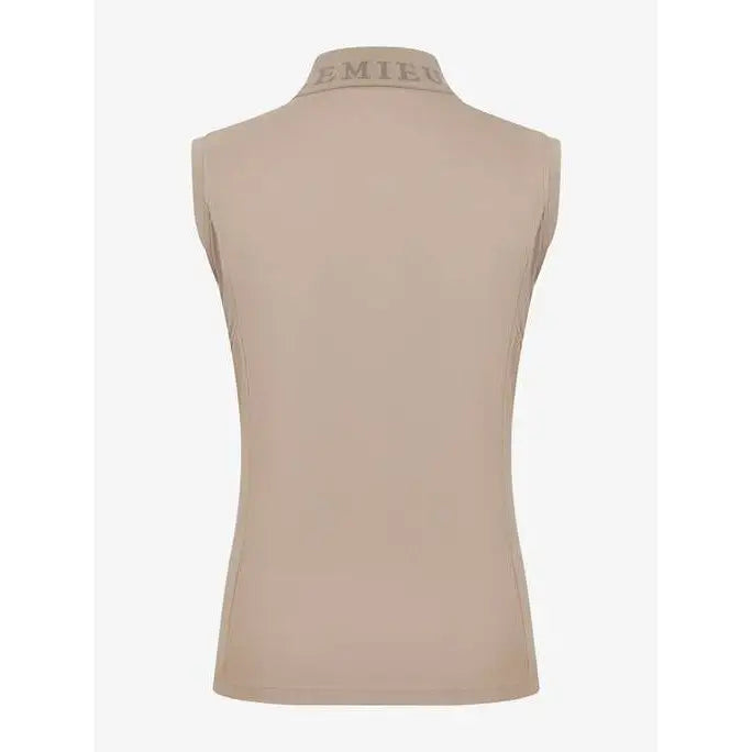 Sleeveless beige Lemieux Sport Polo Mink top with high collar and MIE text in super lightweight fabric