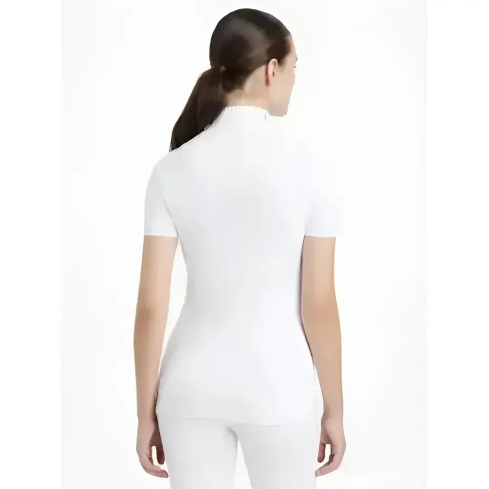 White lemieux sophia short sleeve pleated athletic top with a high neckline perfect for show riding