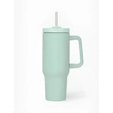 A sleek mint green lemieux sports cup aqua insulated tumbler with white straw handle and minimalist measurement markings