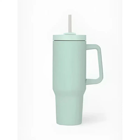 A sleek mint green lemieux sports cup aqua insulated tumbler with white straw handle and minimalist measurement markings