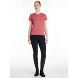 Coral pink lemieux sports t-shirt with short sleeves and a subtle white logo perfect for equestrian activities