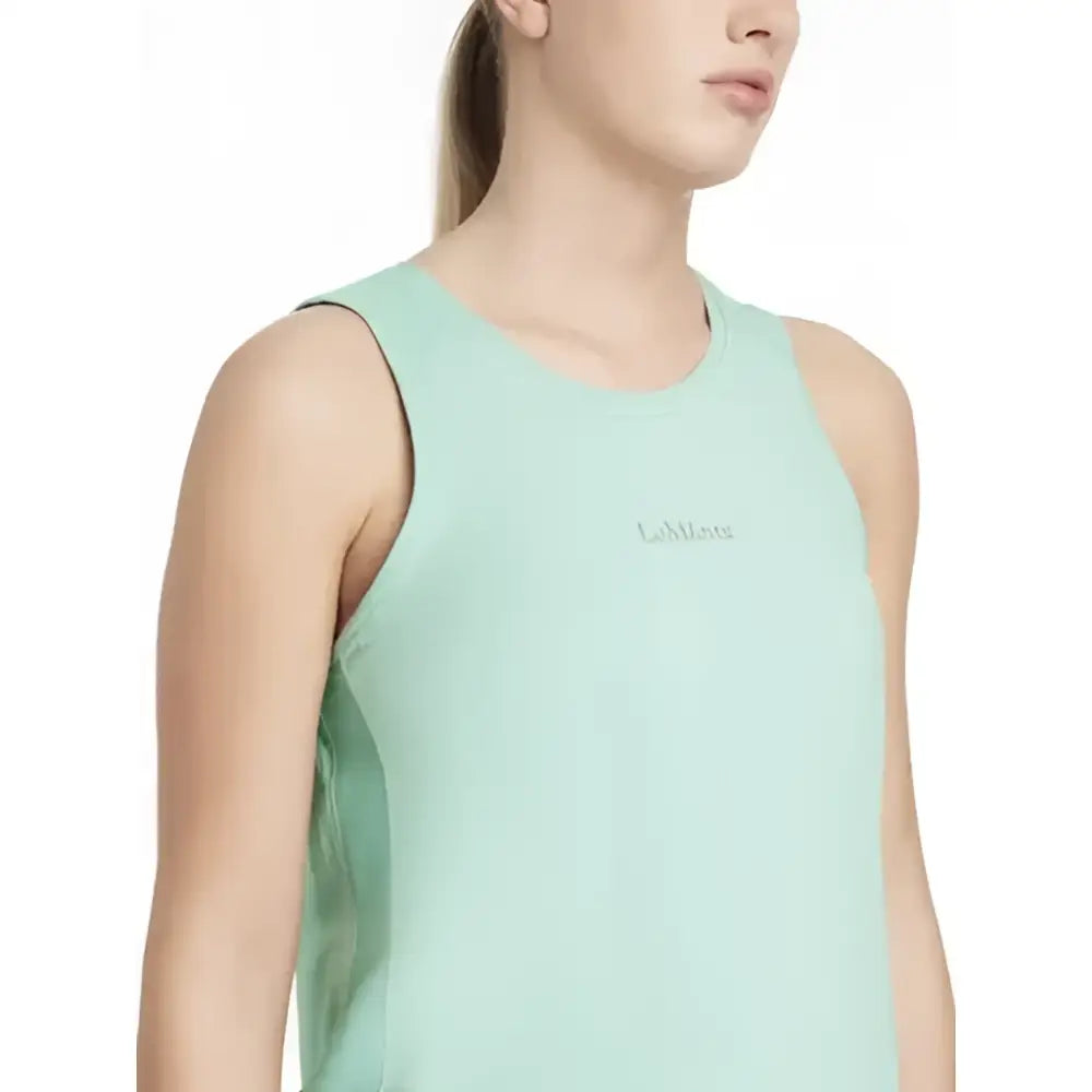 Mint green sleeveless lemieux sports vest aqua with subtle side paneling and small embroidered chest logo