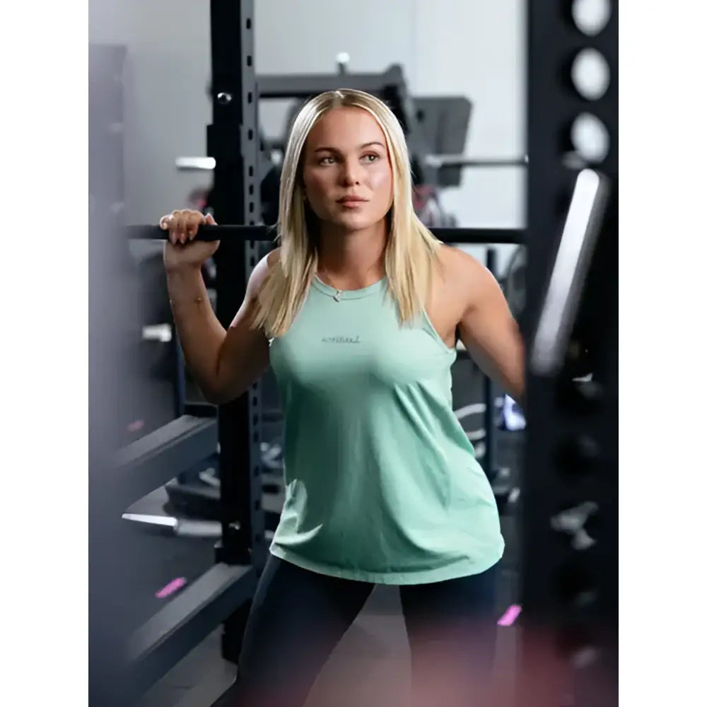 Mint green sleeveless lemieux sports vest aqua with small chest logo perfect for athletic wear