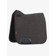 Black woven-textured lemieux suede dressage square cinder with red trim and branded label saddle pad