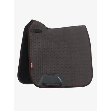 Black woven-textured lemieux suede dressage square cinder with red trim and branded label saddle pad