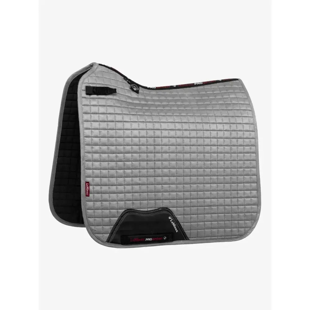 Gray quilted lemieux suede dressage square with soft suede binding black trim and branded logo patch