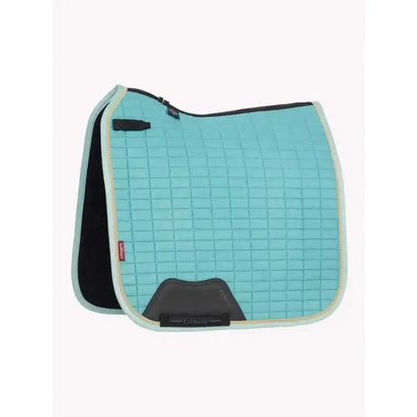 Aqua lemieux suede dressage square lagoon quilted saddle pad with black beige trim and branded logo on side