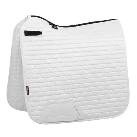 White quilted lemieux suede dressage square with black trim and small brand tag for dressage use
