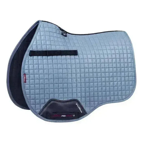 Light blue lemieux suede gp square ice blue quilted equestrian saddle pad with black trim and branded logo patch