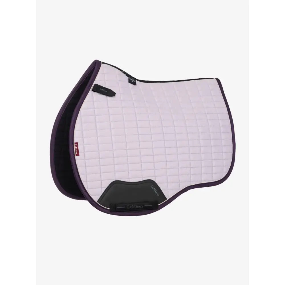White quilted lemieux suede gp square lilac saddle pad with black trim and dark gray reinforced front panel