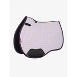 White quilted lemieux suede gp square lilac saddle pad with black trim and dark gray reinforced front panel