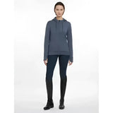 A lemieux tabi tech zip through hoodie dusk blue in dark gray with hood and long sleeves worn by a model