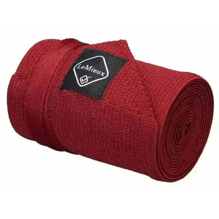 Burgundy lemieux tail bandage with textured fabric and black lemieux brand label perfect for tail protection