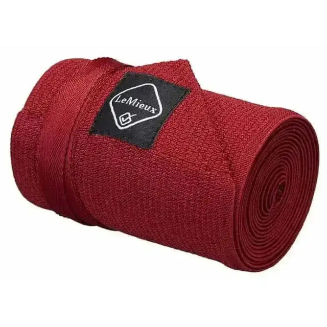 Burgundy lemieux tail bandage with textured fabric and black lemieux brand label perfect for tail protection