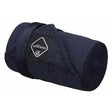 Dark navy blue lemieux tail bandage neatly rolled with matching strap perfect for horse tail bandages use