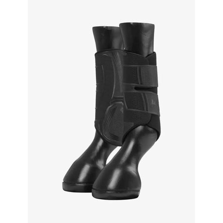 Black lemieux technical brushing boot with adjustable straps and sleek protective design for horse hooves