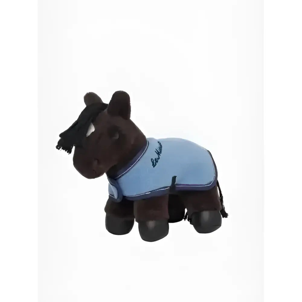 A plush brown lemieux tiny pony freya toy wearing a light blue blanket with embroidered lettering