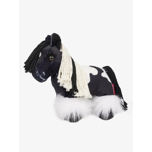 Black and white lemieux tiny pony razzle toy pony with fluffy mane tail and plush feet perfect for kids
