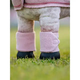 Pink felt lemieux toy pony bandages blossom with stitched edge and snap closure on horse legs
