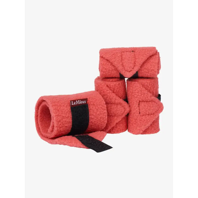 Set of four coral plush-felt lemieux toy pony bandages cranberry with black elastic straps and lemieux labels