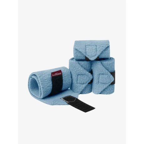 Light blue felt lemieux toy pony bandages ice with black velcro straps and red lemieux label for pony bandages ice blue