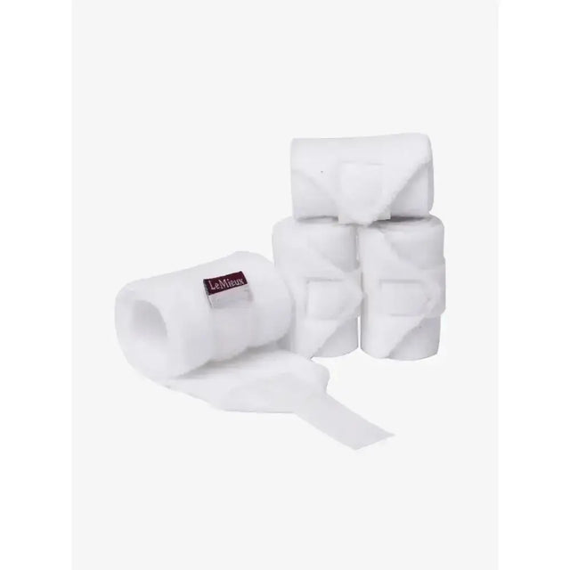 Neatly stacked lemieux toy pony fleece polo bandages white made from soft absorbent fabric with subtle texture