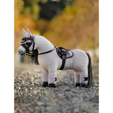 White plush lemieux toy pony blanca with black bridle saddle and leg wraps perfect for play and decor