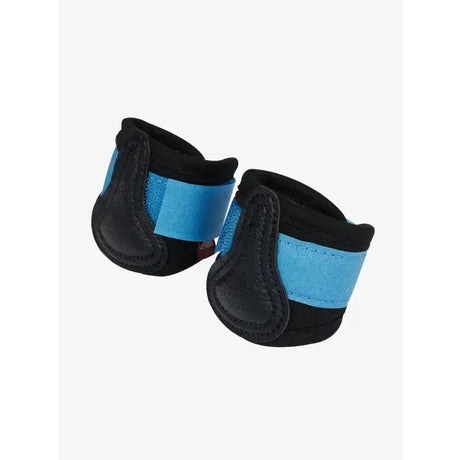 Black and light blue lemieux toy pony boots pacific with padded design for comfort and protection