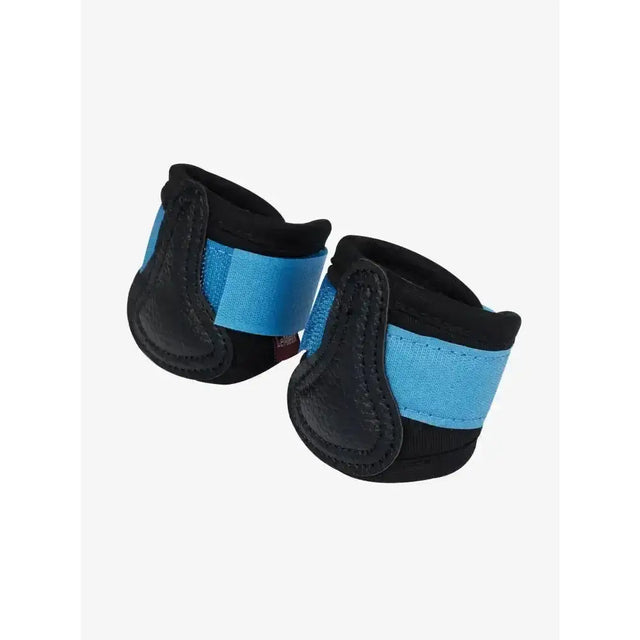 Black and light blue lemieux toy pony boots pacific with padded design for comfort and protection