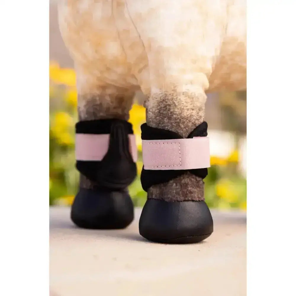Black and pink lemieux toy pony boots with soft padded design for comfort in identical miniature versions