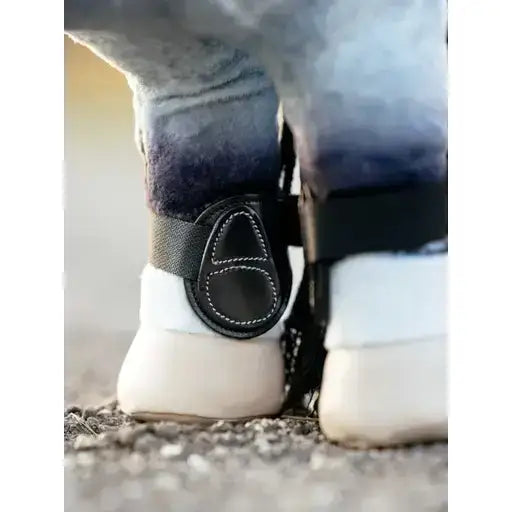 Black leather lemieux toy pony capella boots with white stitching and sleek oval design in capella boots black style