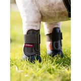 Black leather lemieux toy pony capella boots with red label and white stitching detail in capella boots brown style