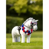 White plush lemieux toy pony coco show pony decorated with red white and blue crocheted garlands and headband
