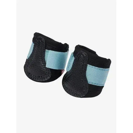 Black and light blue lemieux toy pony grafter boots glacier with textured leather-like material for pony hooves