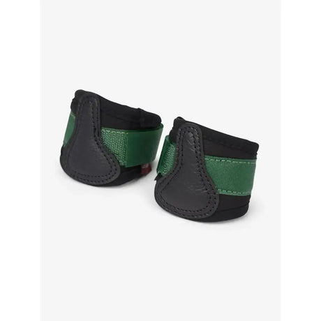 Black and green lemieux toy pony grafter boots with textured strap design in hunter green for durable hoof protection