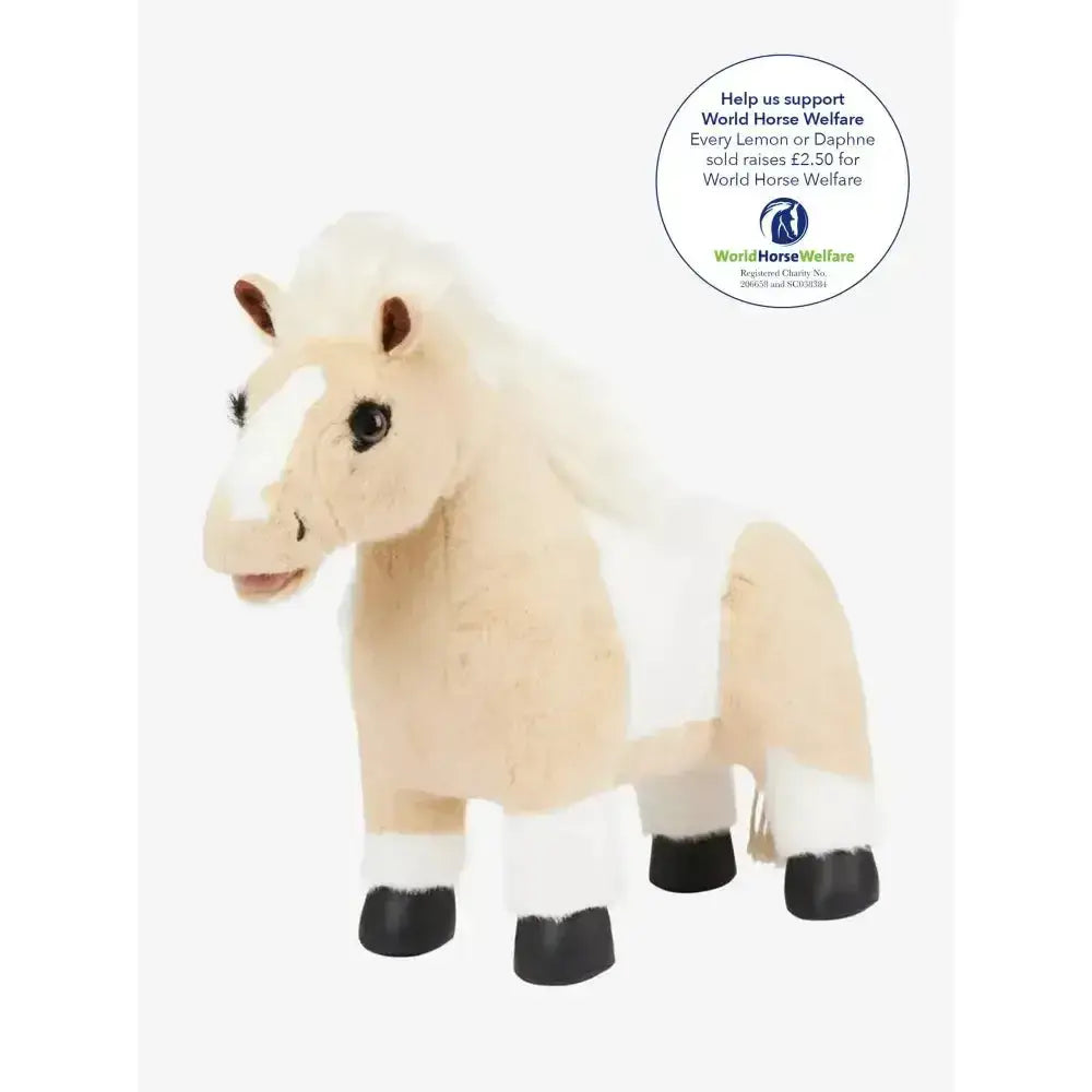 A plush cream lemieux toy pony with white mane tail and cuffs black hooves dark eyes supporting world horse welfare