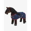 A plush dark brown lemieux toy pony wearing a navy mesh cooler with red trim and silver buckles