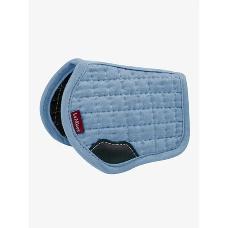 Light blue quilted lemieux toy pony saddle pad with black leather accents and red lemieux tag pony pad ice blue