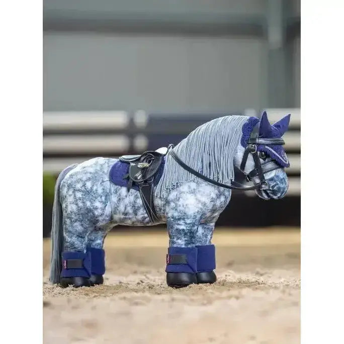 Blue and gray patterned lemieux toy pony figurine with saddle bridle and leg wraps featuring pony pad ink blue