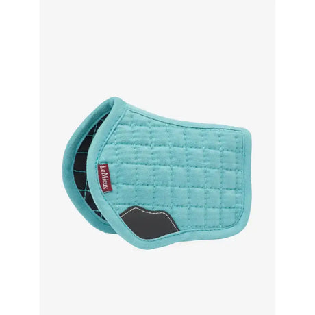 Turquoise quilted lemieux toy pony pad lagoon with black leather patch and red branding for replica lemieux saddle