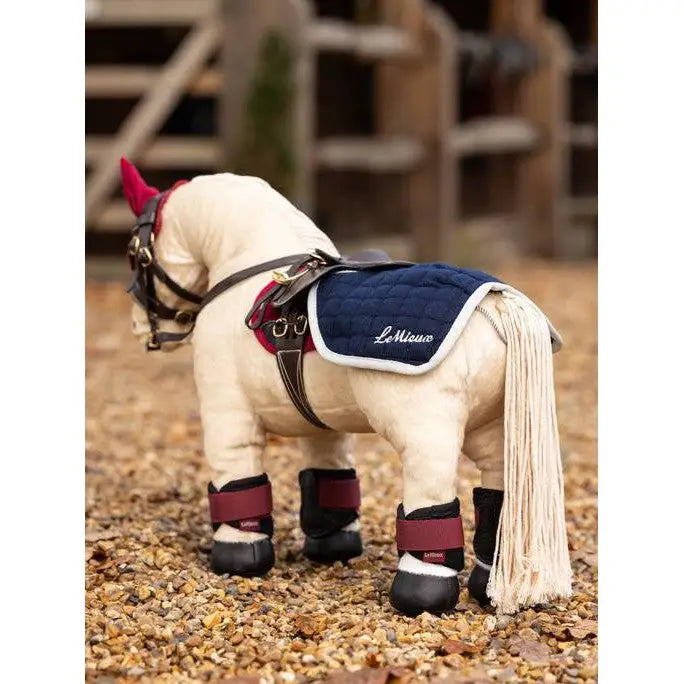 Plush Lemieux Toy Pony in riding gear with pony quarter sheet, perfect for playtime