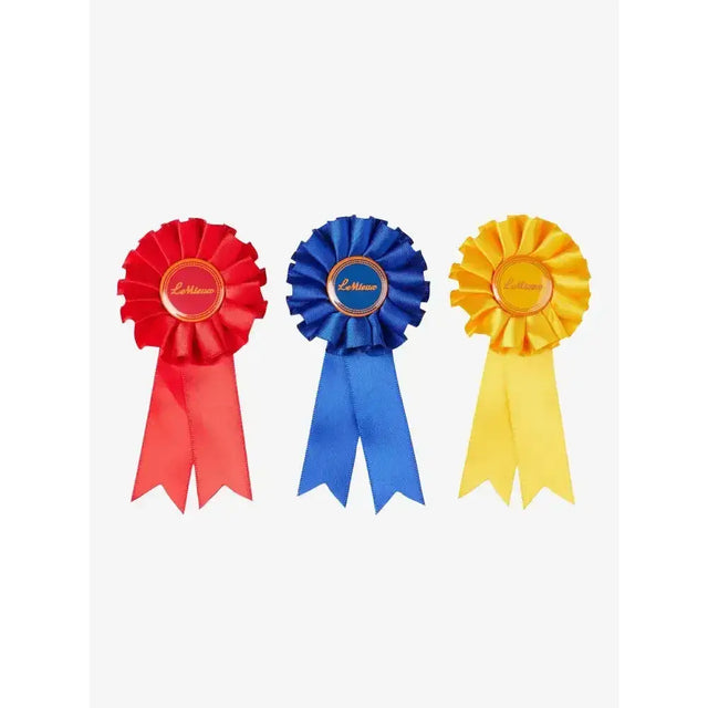 Three vibrant satin lemieux toy pony rosettes in red blue and yellow with metallic logos in a pony rosette pack