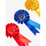 Vibrant satin lemieux toy pony rosette pack in red blue and yellow with gold embossed logos on circular centers