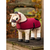 Stuffed toy horse in a red blanket, part of the Lemieux Toy Pony Rug collection