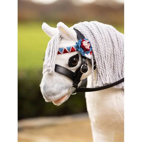 White toy horse with decorative bridle from Lemieux Toy Pony Showing Bridle Black