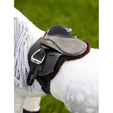 Black leather lemieux toy pony saddle with gray suede accents and brown fleece lining on white horse showing numnah brown