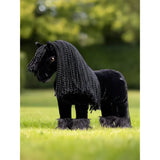 Knitted black Lemieux Toy Pony Spike with yarn mane and feathered hooves at stable door