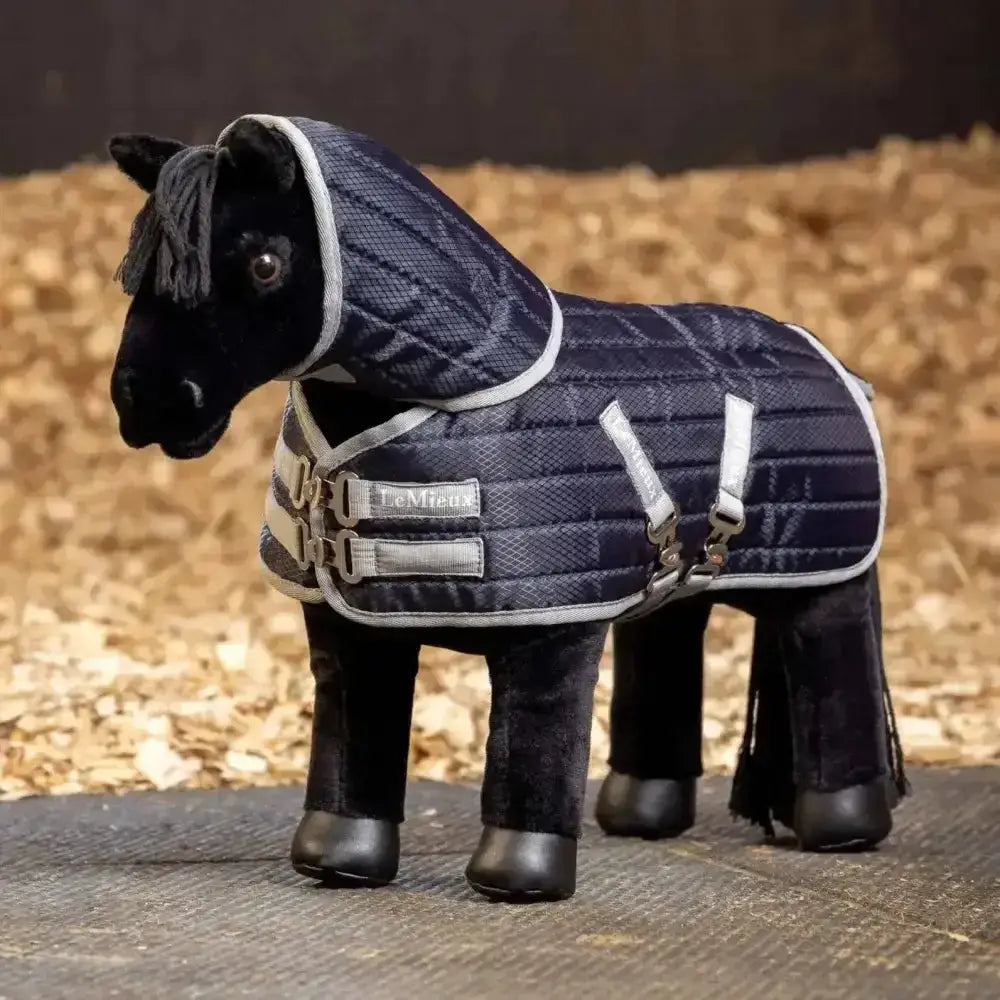 Navy blue quilted shower-resistant miniature turnout rug with silver trim and buckles for lemieux mini pony toys